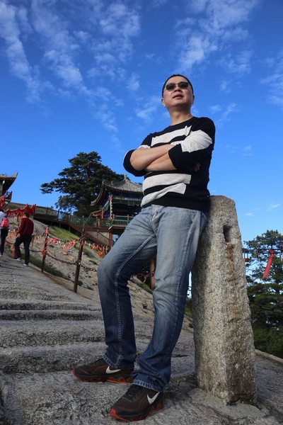 胡坤的写真-坚持创作直抵人心的艺...