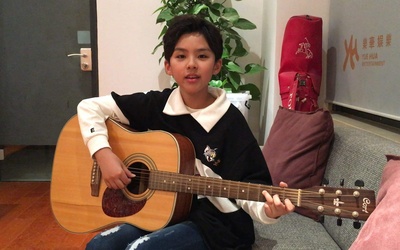 刘冠毅的写真-一首歌几个调，没法唱...