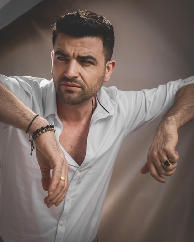 阿摩司·塔玛姆的写真