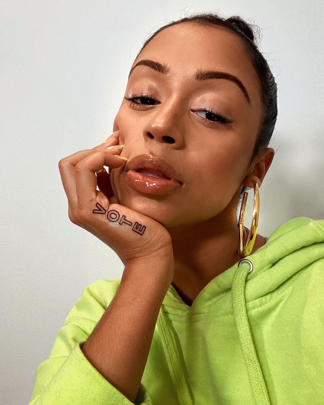 丽兹·考什的写真