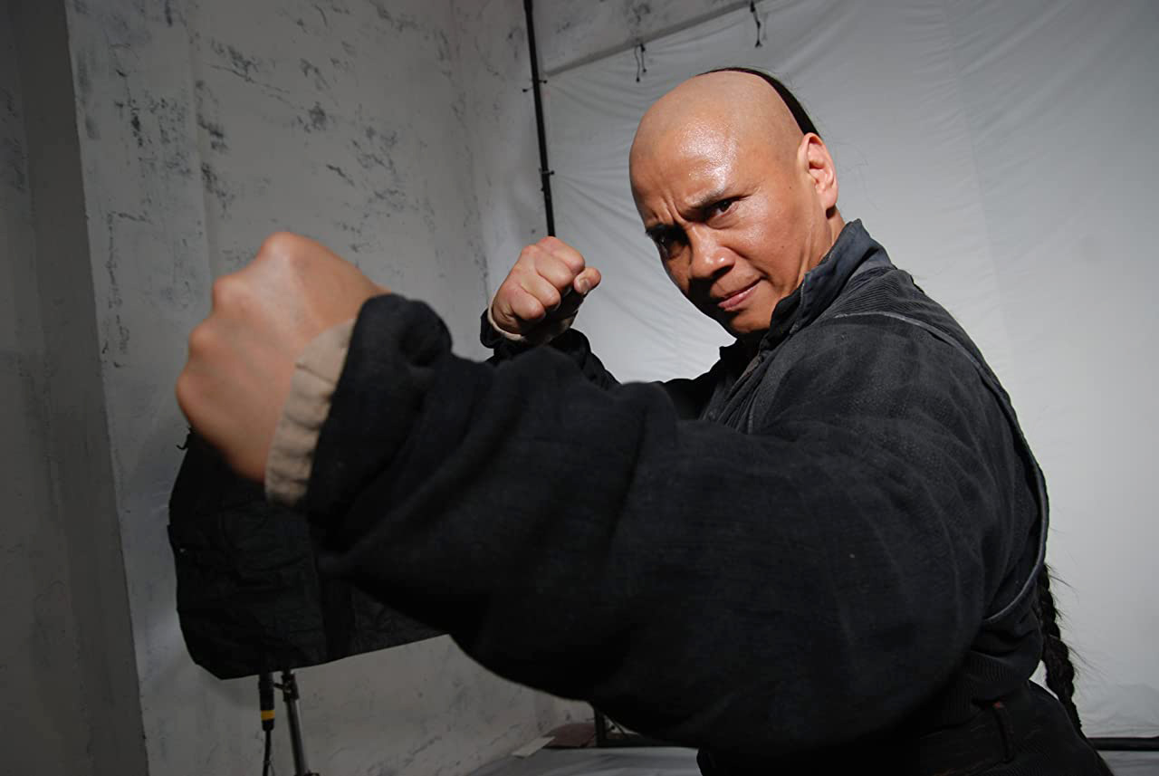 黎烈弓的写真-十月围城 (2009)