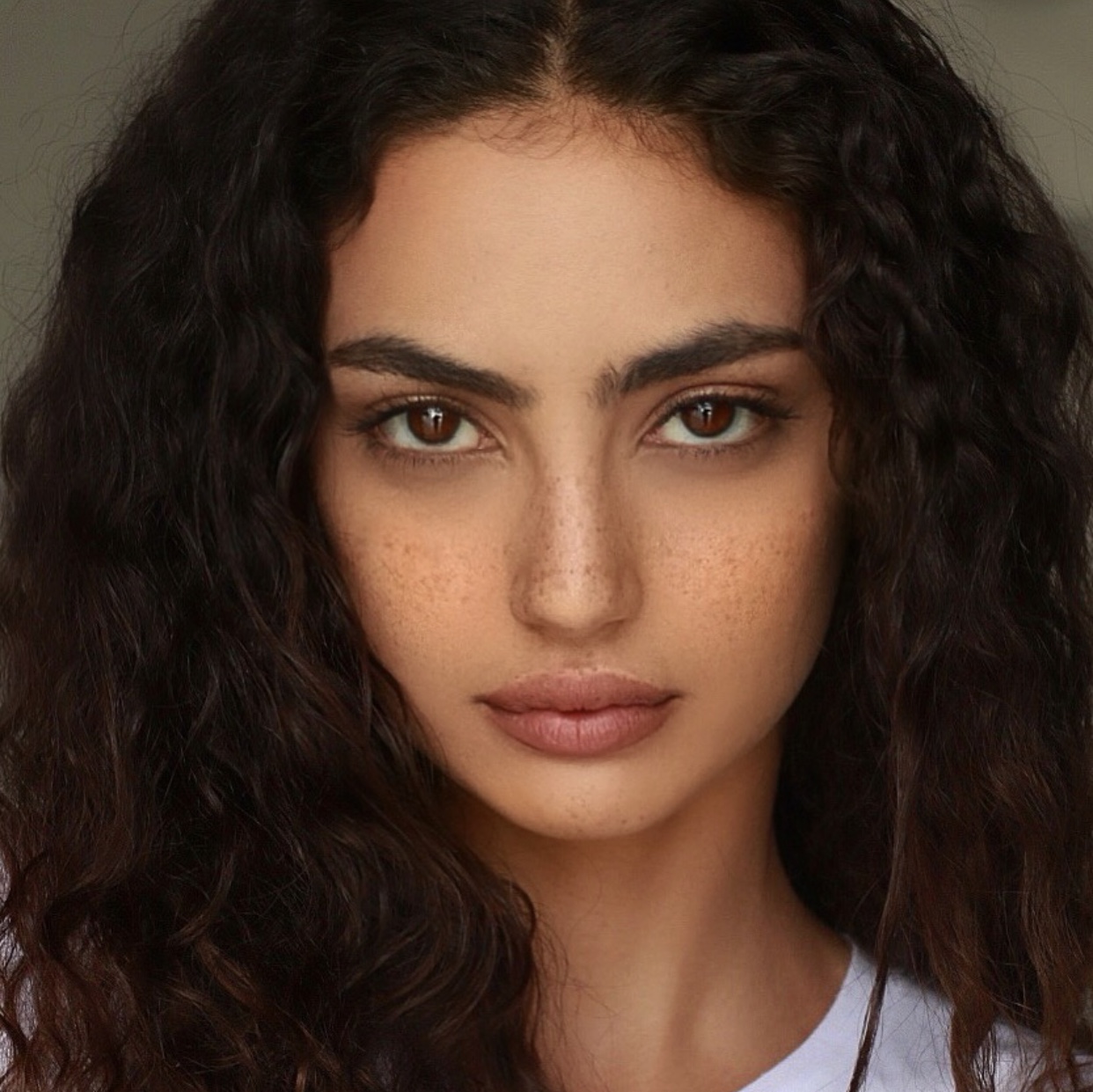 米达宁·拉希米的写真