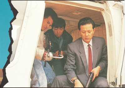 洪宇宙的写真-联手警探中的假钞团伙...